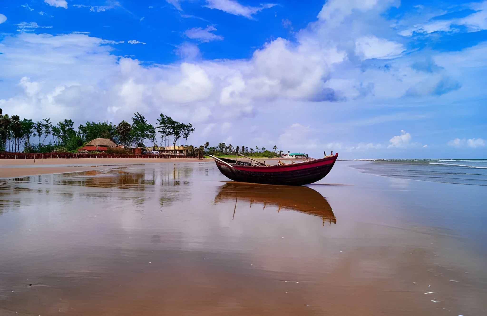 Mandrem Beach Goa wide shoreline scenery for quiet beach holidays.